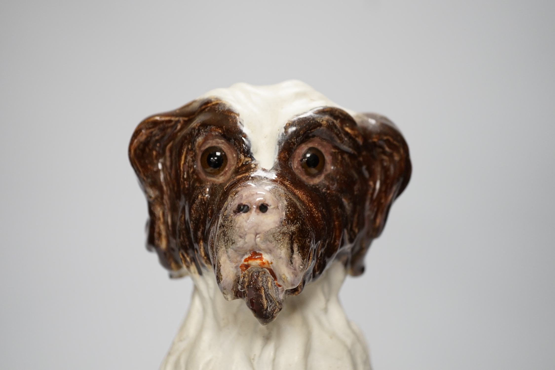 A 'Martel' pottery model of a dog, 33cm